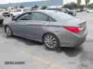 2014 Hyundai Sonata SE with VIN 5NPEC4ACXEH833859, listed as a IAAI auction lot 43589316 with 144,188 mi miles and . Bid and sale history available at DreamBid. Image 3.