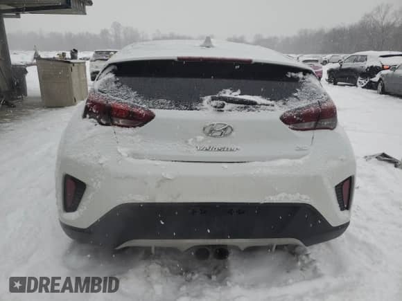 2019 Hyundai Veloster Premium z VIN KMHTG6AF0KU017872, wystawiony jako Copart lot #88317755 z przebiegiem 77 251 mil mil oraz Szkoda całkowita • Salvage title. Historia ofert i sprzedaży dostępna na DreamBid. Obrazek 6.
