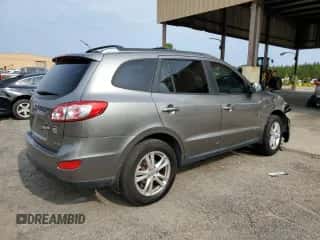 2012 Hyundai Santa Fe Limited с VIN 5XYZK3AB6CG166623, выставлен на аукционе Copart как лот 54138514 с пробегом 119 550 миль миль и Списание • Salvage title. История ставок и продаж доступна на DreamBid. Изображение 3.