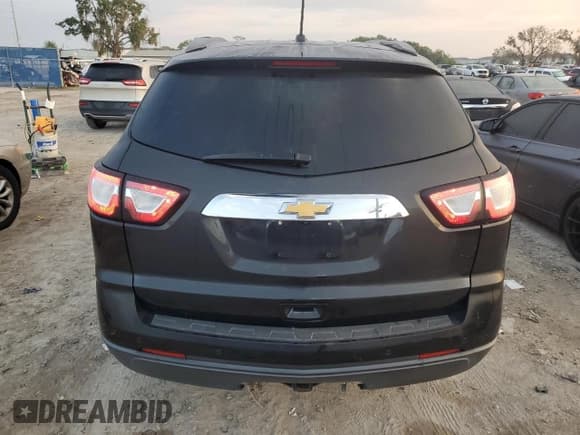 ✅ 2013 Chevrolet Traverse LT • VIN: 1GNKRJKD6DJ138816 • Lot: 71047754. Wystawiony na Copart z przebiegiem 158 837 mil. Bezpłatny archiwum sprzedaży aukcyjnych z USA i szczegółowy raport historii pojazdu na DreamBid. Zdjęcie 6.