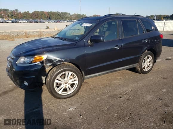 ✅ 2012 Hyundai Santa Fe Limited • VIN: 5XYZKDAG9CG096018 • Lot: 77713144. Listed on Copart with 139,964 mi. Free auction sales archive from the USA and detailed vehicle history report at DreamBid. Image 1.