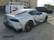 ✅ 2022 Toyota Supra 3.0 • VIN: WZ1DB0C05NW048445 • Лот: 73665812. Опубликован ранее на Copart с пробегом 8 850 миль. Бесплатный доступ к архиву аукционных продаж из США и подробный отчёт об истории автомобиля на DreamBid. Изображение 3.