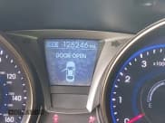 ✅ 2013 Hyundai Genesis Coupe 2.0T • VIN: KMHHT6KD0DU091858 • Lot: 42923154. Wystawiony na IAAI z przebiegiem 128 246 mil. Bezpłatny archiwum sprzedaży aukcyjnych z USA i szczegółowy raport historii pojazdu na DreamBid. Zdjęcie 15.