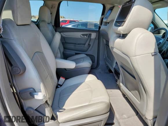 2014 Chevrolet Traverse LT z VIN 1GNKRHKD7EJ203148, wystawiony jako Copart lot #71525975 z przebiegiem 80 745 mil mil oraz Czysty tytuł • Clean title. Historia ofert i sprzedaży dostępna na DreamBid. Obrazek 11.