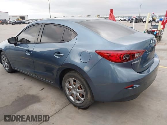 ✅ 2015 Mazda 3 i SV • VIN: JM1BM1T77F1251936 • Лот: 42124495. Опубликован ранее на IAAI с пробегом 82 805 миль. Бесплатный доступ к архиву аукционных продаж из США и подробный отчёт об истории автомобиля на DreamBid. Изображение 3.