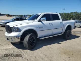 ✅ 2016 Ram 1500 Laramie • VIN: 1C6RR7NT1GS247350 • Lot: 86654045. Listed on Copart with 56,620 mi. Free auction sales archive from the USA and detailed vehicle history report at DreamBid. Image 1.