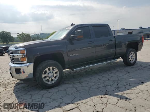 ✅ 2015 Chevrolet Silverado 2500HD LT • VIN: 1GC1KVE8XFF585086 • Lot: 63446335. Listed on Copart with 116,672 mi. Free auction sales archive from the USA and detailed vehicle history report at DreamBid. Image 1.