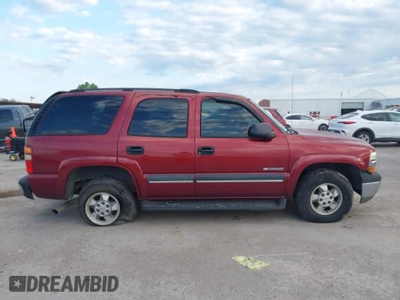 ✅ 2003 Chevrolet Tahoe LS • VIN: 1GNEC13V03R310084 • Lot: 42187078. Listed on IAAI with 217,863 mi. Free auction sales archive from the USA and detailed vehicle history report at DreamBid. Image 13.