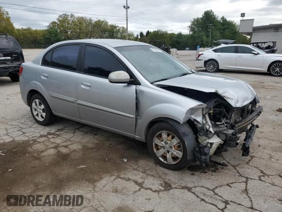 ✅ 2011 Kia Rio LX • VIN: KNADH4A3XB6944105 • Lot: 71802994. Listed on Copart with 117,334 mi. Free auction sales archive from the USA and detailed vehicle history report at DreamBid. Image 4.