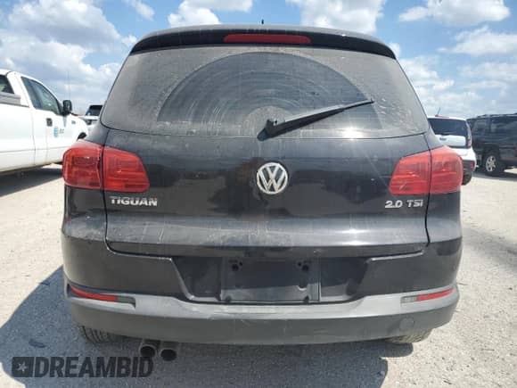 2013 Volkswagen Tiguan SE с VIN WVGAV7AXXDW519677, выставлен на аукционе Copart как лот 72686304 с пробегом Не указан миль и Списание • Salvage title. История ставок и продаж доступна на DreamBid. Изображение 6.