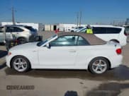 ✅ 2013 BMW 1 Series 128i • VIN: WBAUN1C59DVR00577 • Lot: 43810376. Listed on IAAI with 138,607 mi. Free auction sales archive from the USA and detailed vehicle history report at DreamBid. Image 15.