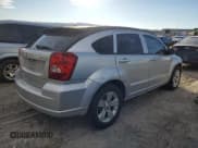 ✅ 2010 Dodge Caliber SXT • VIN: 1B3CB4HA2AD576034 • Лот: 83079904. Опубликован ранее на Copart с пробегом 174 867 миль. Бесплатный доступ к архиву аукционных продаж из США и подробный отчёт об истории автомобиля на DreamBid. Изображение 3.
