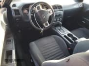 ✅ 2012 Dodge Challenger SXT • VIN: 2C3CDYAG7CH162191 • Lot: 46945085. Wystawiony na Copart z przebiegiem 124 439 mil. Bezpłatny archiwum sprzedaży aukcyjnych z USA i szczegółowy raport historii pojazdu na DreamBid. Zdjęcie 8.