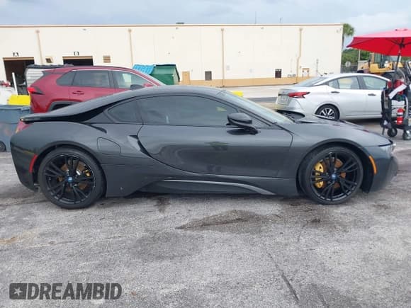 ✅ 2017 BMW i8 • VIN: WBY2Z2C33HV676861 • Лот: 42418897. Опубликован ранее на IAAI с пробегом 88 128 миль. Бесплатный доступ к архиву аукционных продаж из США и подробный отчёт об истории автомобиля на DreamBid. Изображение 13.