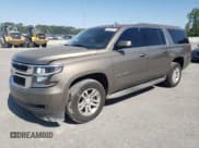 ✅ 2015 Chevrolet Suburban LS • VIN: 1GNSCHEC2FR682392 • Lot: 54833925. Listed on Copart with 156,667 mi. Free auction sales archive from the USA and detailed vehicle history report at DreamBid. Image 1.