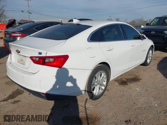 ✅ 2016 Chevrolet Malibu Hybrid • VIN: 1G1ZJ5SU8GF243069 • Lot: 43690551. Listed on IAAI with 31,827 mi. Free auction sales archive from the USA and detailed vehicle history report at DreamBid. Image 4.