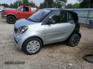 ✅ 2016 Smart fortwo Passion • VIN: WMEFJ5DA6GK057472 • Lot: 74035244. Wystawiony na Copart z przebiegiem 67 826 mil. Bezpłatny archiwum sprzedaży aukcyjnych z USA i szczegółowy raport historii pojazdu na DreamBid. Zdjęcie 1.