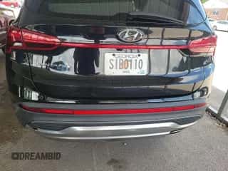 2021 Hyundai Santa Fe SEL z VIN 5NMS24AJ5MH322091, wystawiony jako IAAI lot #42854429 z przebiegiem 122 071 mil mil oraz . Historia ofert i sprzedaży dostępna na DreamBid. Obrazek 1.