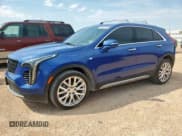 ✅ 2023 Cadillac XT4 AWD Premium Luxury • VIN: 1GYFZDR45PF108385 • Лот: 67392095. Опубликован ранее на Copart с пробегом 31 515 миль. Бесплатный доступ к архиву аукционных продаж из США и подробный отчёт об истории автомобиля на DreamBid. Изображение 1.