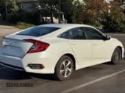 ✅ 2019 Honda Civic LX • VIN: 19XFC2F65KE041632 • Lot: 43773830. Listed on IAAI with 148,787 mi. Free auction sales archive from the USA and detailed vehicle history report at DreamBid. Image 4.