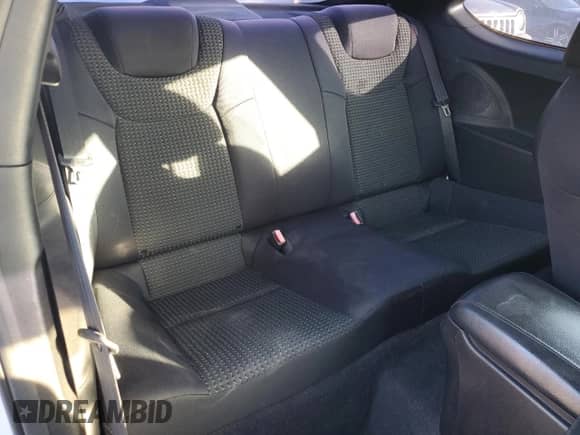 2010 Hyundai Genesis Coupe Premium z VIN KMHHT6KD0AU004424, wystawiony jako Copart lot #89006215 z przebiegiem 128 992 mil mil oraz Szkoda całkowita • Salvage title. Historia ofert i sprzedaży dostępna na DreamBid. Obrazek 10.