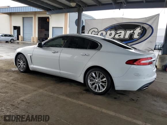✅ 2013 Jaguar XF RWD • VIN: SAJWA0E71D8S71834 • Lot: 82204345. Listed on Copart with 130,826 mi. Free auction sales archive from the USA and detailed vehicle history report at DreamBid. Image 2.