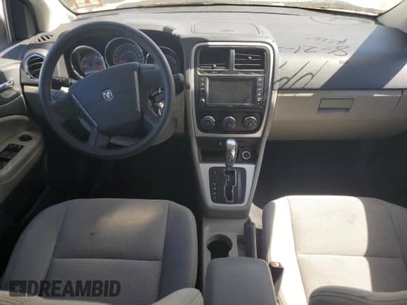 2011 Dodge Caliber Mainstreet z VIN 1B3CB3HA7BD268448, wystawiony jako Copart lot #73742484 z przebiegiem 176 439 mil mil oraz Szkoda całkowita • Salvage title. Historia ofert i sprzedaży dostępna na DreamBid. Obrazek 8.