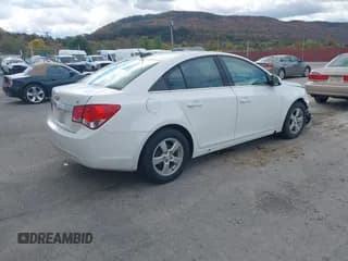 ✅ 2016 Chevrolet Cruze LT • VIN: 1G1PE5SB2G7210301 • Lot: 43517445. Listed on IAAI with 102,515 mi. Free auction sales archive from the USA and detailed vehicle history report at DreamBid. Image 4.