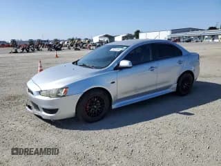 ✅ 2014 Mitsubishi Lancer ES • VIN: JA32U2FUXEU019592 • Lot: 85207985. Listed on Copart with 177,301 mi. Free auction sales archive from the USA and detailed vehicle history report at DreamBid. Image 1.
