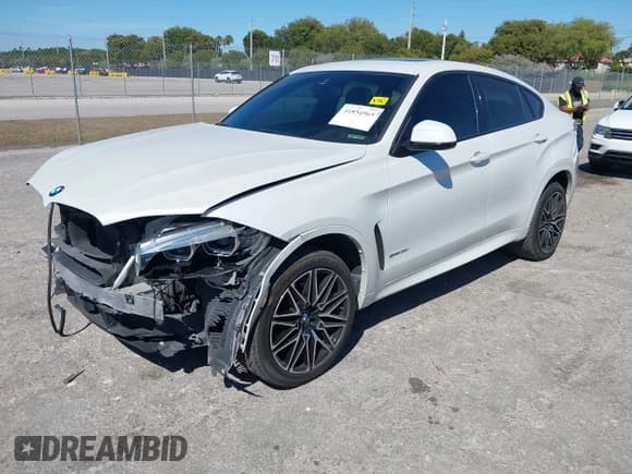 ✅ 2018 BMW X6 sDrive35i • VIN: 5UXKU0C56J0G69848 • Lot: 41854965. Listed on IAAI with 91,176 mi. Free auction sales archive from the USA and detailed vehicle history report at DreamBid. Image 2.
