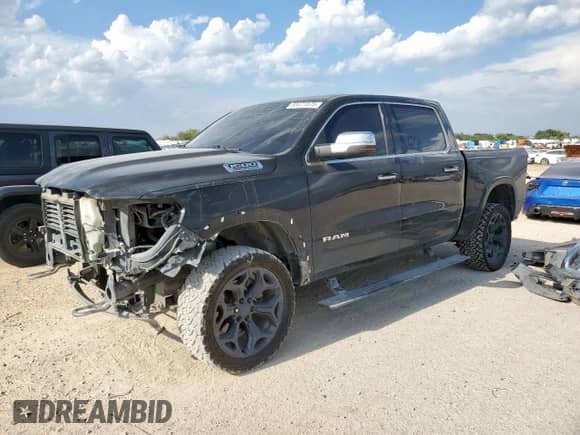 2021 Ram 1500 Limited with VIN 1C6SRFHT5MN665217, listed as a Copart auction lot 68471575 with 105,990 mi miles and Salvage title. Bid and sale history available at DreamBid. Image 1.