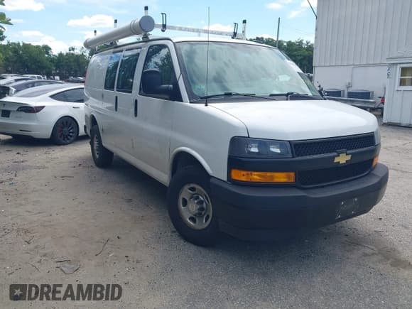 ✅ 2021 Chevrolet Express Cargo • VIN: 1GCWGAFP6M1231601 • Lot: 42763185. Listed on IAAI with 105,783 mi. Free auction sales archive from the USA and detailed vehicle history report at DreamBid. Image 1.