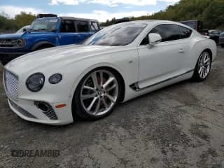 ✅ 2022 Bentley Continental GT GT V8 • VIN: SCBCG2ZG4NC096647 • Lot: 74068264. Listed on Copart with 14,666 mi. Free auction sales archive from the USA and detailed vehicle history report at DreamBid. Image 1.