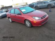 ✅ 2003 Ford Focus LX • VIN: 1FAFP33P33W245107 • Lot: 43434445. Listed on IAAI with 135,370 mi. Free auction sales archive from the USA and detailed vehicle history report at DreamBid. Image 1.