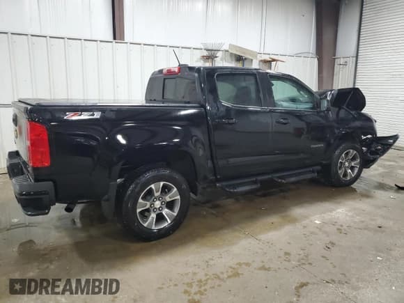 ✅ 2018 Chevrolet Colorado 4WD Z71 • VIN: 1GCGTDEN2J1206000 • Лот: 71244194. Опубликован ранее на Copart с пробегом 75 990 миль. Бесплатный доступ к архиву аукционных продаж из США и подробный отчёт об истории автомобиля на DreamBid. Изображение 3.