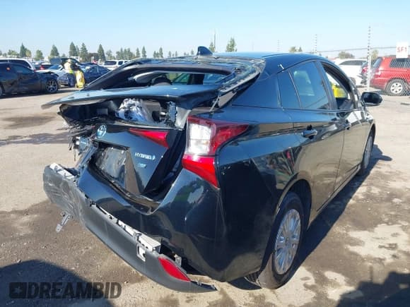 ✅ 2022 Toyota Prius L Eco • VIN: JTDKAMFU2N3162810 • Lot: 43566451. Listed on IAAI with 92,732 mi. Free auction sales archive from the USA and detailed vehicle history report at DreamBid. Image 4.