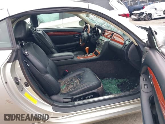 ✅ 2004 Lexus SC 430 • VIN: JTHFN48Y140058295 • Lot: 42883490. Listed on IAAI with 121,555 mi. Free auction sales archive from the USA and detailed vehicle history report at DreamBid. Image 5.