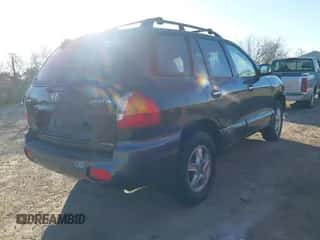 2001 Hyundai Santa Fe GLS z VIN KM8SC83D11U135037, wystawiony jako IAAI lot #41452112 z przebiegiem 334 211 mil mil oraz . Historia ofert i sprzedaży dostępna na DreamBid. Obrazek 4.