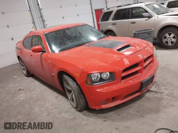 2009 Dodge Charger SRT-8 с VIN 2B3LA73W59H598180, выставлен на аукционе IAAI как лот 41392102 с пробегом Не указан миль и . История ставок и продаж доступна на DreamBid. Изображение 1.