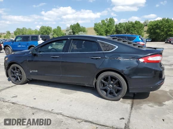 ✅ 2013 Ford Fusion Titanium Hybrid • VIN: 3FA6P0RU5DR367807 • Lot: 62542965. Listed on Copart with 177,134 mi. Free auction sales archive from the USA and detailed vehicle history report at DreamBid. Image 2.