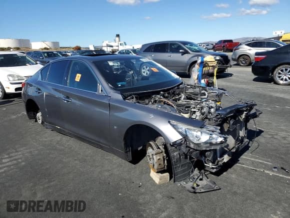 ✅ 2015 Infiniti Q50 Premium • VIN: JN1BV7AP4FM349018 • Лот: 82786455. Опубликован ранее на Copart с пробегом 170 162 миль. Бесплатный доступ к архиву аукционных продаж из США и подробный отчёт об истории автомобиля на DreamBid. Изображение 4.