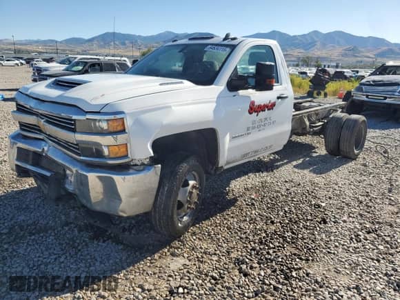 2018 Chevrolet Silverado 3500HD Work Truck with VIN 1GB3KYCY9JF198538, listed as a Copart auction lot 64634115 with 125,003 mi miles and Salvage title. Bid and sale history available at DreamBid. Image 1.