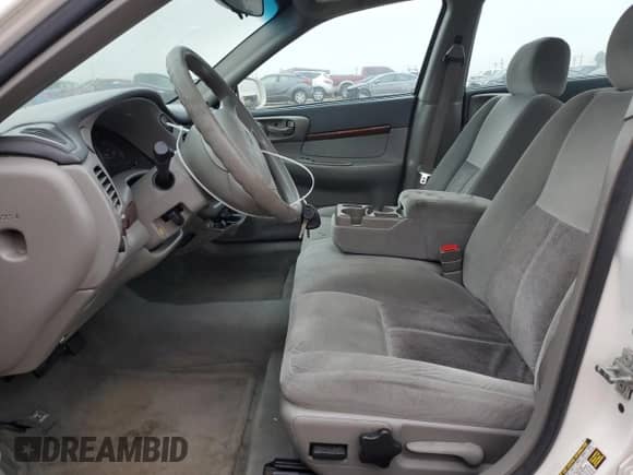 2004 Chevrolet Impala with VIN 2G1WF52E749325697, listed as a Copart auction lot 66771124 with 156,757 mi miles and Clean title. Bid and sale history available at DreamBid. Image 7.