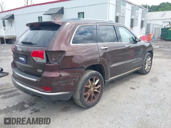 ✅ 2015 Jeep Grand Cherokee Summit • VIN: 1C4RJFJG1FC629969 • Lot: 42707649. Listed on IAAI with 140,850 mi. Free auction sales archive from the USA and detailed vehicle history report at DreamBid. Image 4.
