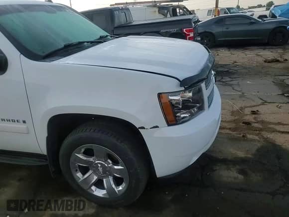2007 Chevrolet Tahoe LTZ z VIN 1GNFK13097J383373, wystawiony jako Copart lot #66365785 z przebiegiem 197 645 mil mil oraz Szkoda całkowita • Salvage title. Historia ofert i sprzedaży dostępna na DreamBid. Obrazek 14.