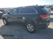 ✅ 2017 Jeep Grand Cherokee Laredo • VIN: 1C4RJFAG9HC864302 • Lot: 92949395. Listed on Copart with 157,611 mi. Free auction sales archive from the USA and detailed vehicle history report at DreamBid. Image 2.