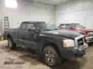 2006 Dodge Dakota SLT with VIN 1D7HW42NX6S516046, listed as a Copart auction lot 45693175 with 151,044 mi miles and Salvage title. Bid and sale history available at DreamBid. Image 4.
