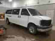 2014 Chevrolet Express Passenger LT z VIN 1GAZG1FG4E1176590, wystawiony jako Copart lot #83660024 z przebiegiem 167 653 mil mil oraz Szkoda całkowita • Salvage title. Historia ofert i sprzedaży dostępna na DreamBid. Obrazek 4.