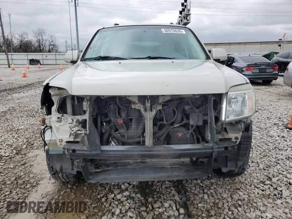 2009 Mercury Mariner Premier with VIN 4M2CU97789KJ11559, listed as a Copart auction lot 50976635 with 152,481 mi miles and Salvage title. Bid and sale history available at DreamBid. Image 5.