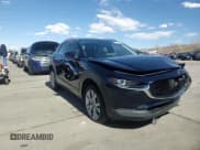 ✅ 2023 Mazda CX-30 S Carbon Edition • VIN: 3MVDMBCM3PM554378 • Lot: 50558075. Listed on Copart with 26,658 mi. Free auction sales archive from the USA and detailed vehicle history report at DreamBid. Image 14.